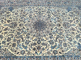 Decorative Masterpiece wool and silk Persian Nain rug with intricate blue and beige pattern