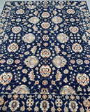 Decorative Afghan Chobi rug with floral pattern on a blue background