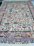 This exquisite Persian Kashmar rug a true gem, boasting a large room size and authentic handmade craftsmanship. Its unique pattern is a rarity, making it difficult to find another rug of this quality