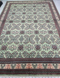 Large room size Afghan Rug In Light Green Tone.