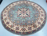 Pure wool hand-knotted Afghan Kazak rug 250x250cm with sky blue centre, ivory border and classic geometric motifs. Full room-size round statement piece.