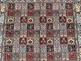 A square Persian Birjand rug with a multi-colored floral and geometric pattern.