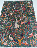 Colorful Afghan Chobi rug with nature-themed design featuring trees, birds, and flowers on a green background.
