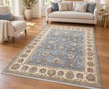 Room size muted blue tone wool handmade Afghan Chobi rug 241x175cm Australia
