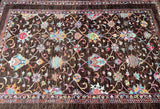A brown and multicolored pure wool hand knotted floral patterned Afghan Chobi rug.