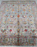 Decorative Afghan Chobi rug with intricate patterns on a plain background