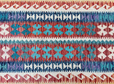 A decorative hand woven Afghan Kyber Kilim Hall Runner featuring a geometric boho design with a mix of red, blue, and beige colors.