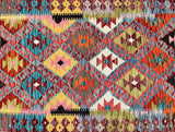 Close-up of a colorful geometric Afghan ilim rug 184x125cm