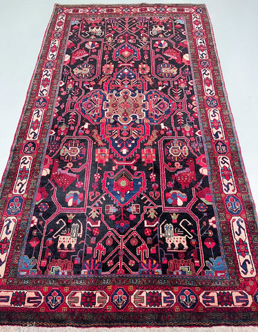 files/handmade-persian-tuserkan-rug-geometric-medallion.jpg