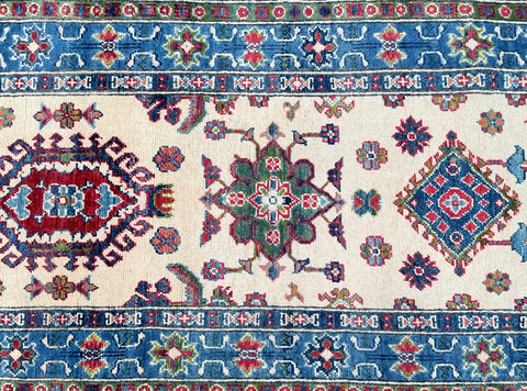 files/kazak-hall-runner-585x80cm-handmade-wool-geometric-tribal-rug.jpg