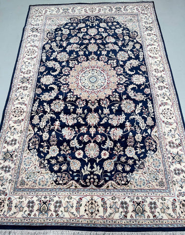 files/navy-jaipur-nain-rug-307x195cm-floral-design.jpg