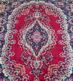 A handmade Persian Mood rug 410 x 320cm with a deep maroon red background and a central medallion floral design surrounded by smaller floral patterns in various colors.