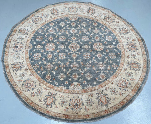 files/round-afghan-chobi-rug-muted-teal-ivory-floral-design.jpg