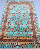 Turquoise-rug