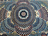 A traditional hand-knotted Afghan Roshnai rug with a geometric mandala design in various colors including blue, beige, yellow, burgundy, and indigo.