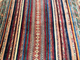 A multicolored striped shawl design traditional Afghan Royal Kazak rug.