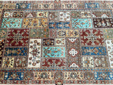 A hand-knotted Afghan Super Kazak rug with a floral and geometric pattern in beige, brown, blue, orange, and green.